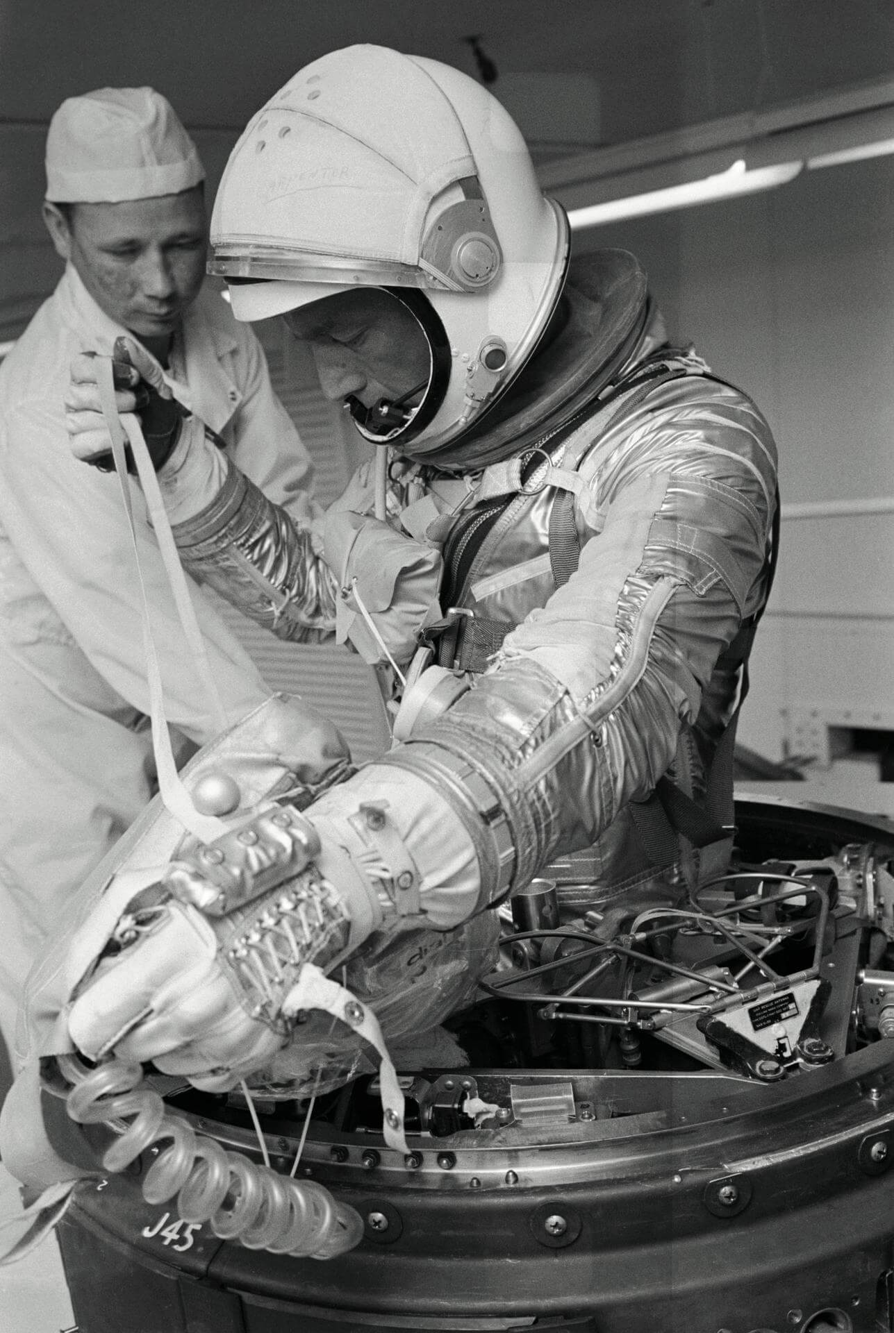 Image of an Astronaut and the ground team doing some tests